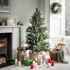 A tan skirt and white blouse by ralph lauren, and a matching green sweater and pleated skirt. Christmas Tree Skirts The Best Tree Collars To Buy In 2020