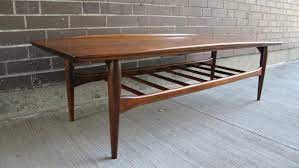 The perfect coffee table is supposed to look great while also fitting in well with the rest of the modern design in the room. Mid Century Modern Bassett Artisan Walnut Surfboard Coffee Table By Wrightfindsinmcm From Wright Finds In Mcm Of Dedham Ma Attic