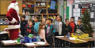Santa and friends visit classrooms