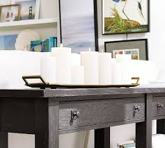 Think of it as wearing 2. Rectangular Cast Decorative Tray Pottery Barn