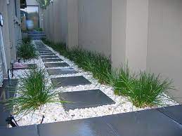 Build out a gorgeous elevated garden box around the outside of your reflection pool and plant tropical foliage like palms and ferns, along with some bright colored flowers to give it a little bit of character. 24 Best White Gravel Landscaping Ideas Designs For 2021