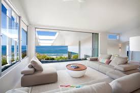 Curtains, blinds, furniture, kitchens, bathrooms, colours. Bold Exterior Beach House With Minimalist Interiors