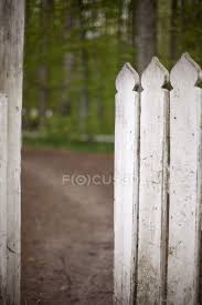 Picket fence w/ birhouse tops. White Picket Fence With Open Garden Gate Natural Shaped Stock Photo 192125578