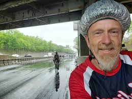 Using shower caps to keep bike helmets dry in rainy conditions