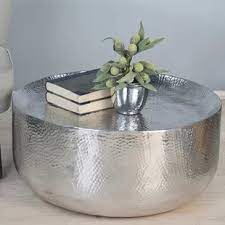 This decorative coffee table features a stylish hammered aluminum finish. World Menagerie Ayman Drum Coffee Table In 2021 Hammered Coffee Table Drum Coffee Table Silver Coffee Table