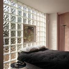 Blue colored glass block shower wall design. Hollow Glass Block