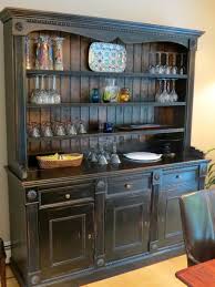 There are countless options for dining room storage. Hutch Buffett