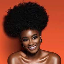 I M Smiling Not Because I Don T Face Tough Times But Because I Don T Face Them Alone I Have The Holy Spirit As Natural Hair Styles Afro Puff Dark Skin Beauty