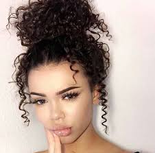 On the last wraparound of the elastic, leave some hair out. Cute Messy Bun Curly Hair Novocom Top