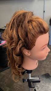 An assignment-Marcel curls with updo.