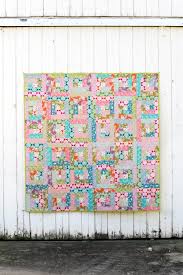 Several designers provided free block patterns for the quilt. In Color Order Fat Quarter Log Cabin Quilt Tutorial