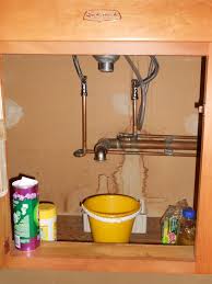 fix leaky pipes under your kitchen sink