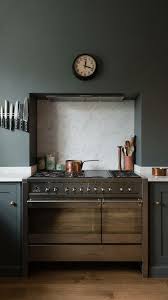 Recessed Stove Looks Like Wood Cabinet In This Modern Dark Sage Kitchen With White Countertops Devol Kitchens Kitchen Design Kitchen Interior