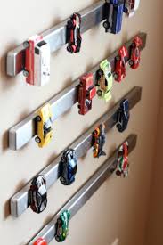 Get those builky plastic guns off the floor with the easy diy nerf gun storage idea! Easy Kids Toy Storage Ideas 15 Kids Storage Solutions