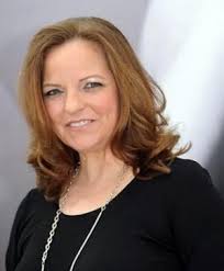 Nina Webster (Tricia Cast) en visite à Genoa