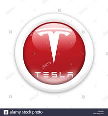 The tesla logo is a monochromatic design that just uses a bold red color on a transparent background. Tesla Logo Stockfotografie Alamy