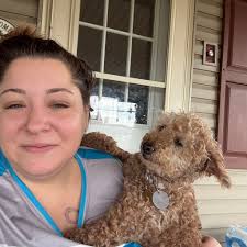 We adopted a 7-year-old mini golden doodle named Flame