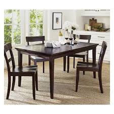 A serpentine metal support brace adds a distinctive flourish to this table's rustic good looks. Pottery Barn Dining Table Wild Country Fine Arts