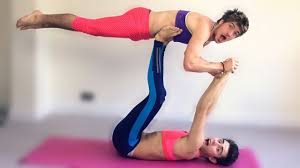 The partner yoga poses allow for mutual reliance on each other for balance, alignment, and focus. Yoga Challenge Poses 2 Persons Partner Yoga 7 Yoga Poses For Two People Besties Partners And Total Strangers Too