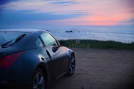Sports Car Sunset Beautiful Sunset With Black Sports Car Nissan 350z Ad Sunset Beautiful Sports Car Sunset Ad Sports Car Photo Sunset