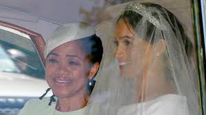 While we know a few official details on the royal big day via kensington palace (like the flavor of buttercream cake), there's still a big question mark when it comes to who is designing. Doria Ragland Meghan Markle S Mother By Her Side On Wedding Day Cnn