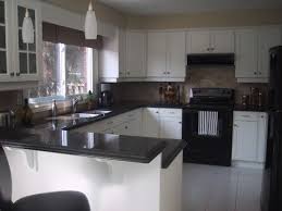 Black Appliances Design Ideas Pictures Remodel And Decor Kitchen Cabinets With Black Appliances Black Appliances Kitchen Contemporary Kitchen