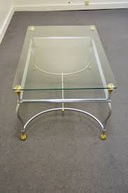 This coffee table is 18″ tall by 54″ square and is placed into a very large and beautiful great room. Maison Jansen Style Brass Brushed Steel And Glass Ball And Claw Foot Coffee Table For Sale At 1stdibs