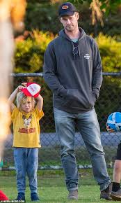 'full of adventures!' elsa pataky shares adorable photo of her and chris hemsworth's twin sons sasha and tristan holding hands. Chris Hemsworth Is A Doting Father At Soccer Practice Daily Mail Online