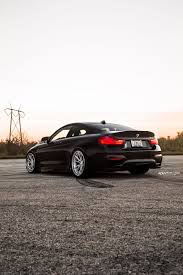 Black Sapphire Metallic Bmw M4 Adorned With Aftermarket Parts Bmw Bmw M4 Black Sapphire