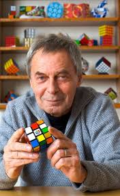 Happy Birthday Erno Rubik, The inventor of the Rubik's Cube turns 77 today.  Rubik was a professor in Budapest and designed the cube to help his  students understand three-dimensional problems, after building