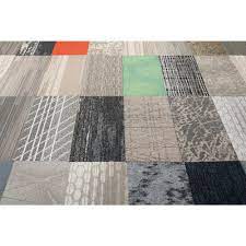 Carefully place the carpet tiles along the chalk line. Trafficmaster Assorted Pattern Commercial Peel And Stick 9 In X 36 In Carpet Tile Plank 12 Tiles Case 18028 The Home Depot