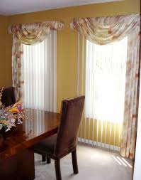 They don't take up too much room and simply slide out of the way. Like The Idea For Dressing Vertical Blinds Up Vertical Blinds Valance Valances For Living Room Curtains With Blinds