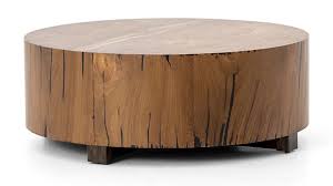 If you have a particularly soft rug, consider sitting on the ground around your table and using it for a game night or wine and cheese party. Dillon Natural Yukas Round Wood Coffee Table Reviews Crate And Barrel Coffee Table Wood Round Wood Coffee Table Coffee Table