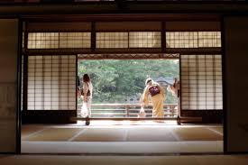 An attractive looking lady answered the front door. Shoji Wikipedia