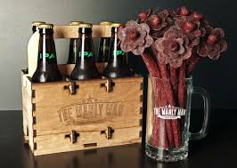 Because men couldn't possibly be caught dead with flowers, someone created broquets made out of beef jerky. Beef Jerky Flower Bouquet Beef Jerky Bouquet Diy Father S Day Gifts Beef Jerky