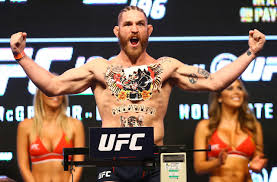 Mcgregor has several cool tattoos on his body. Ufc 196 Weigh In Photos Fake Mcgregor Tattoos Flipping Birds Rubbing Bellies Mma Junkie