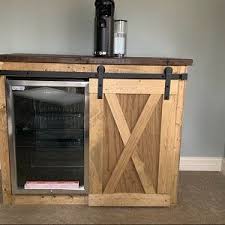 Bigger Mini Size Fridge Farmhouse Style With A Barn Door Slider Cabinet Modern Style Coffee Station Mini Fridge Bar Coffee Bar In 2020 Barn Door Sliders Mini Fridge Cabinet Mini Fridge Bar