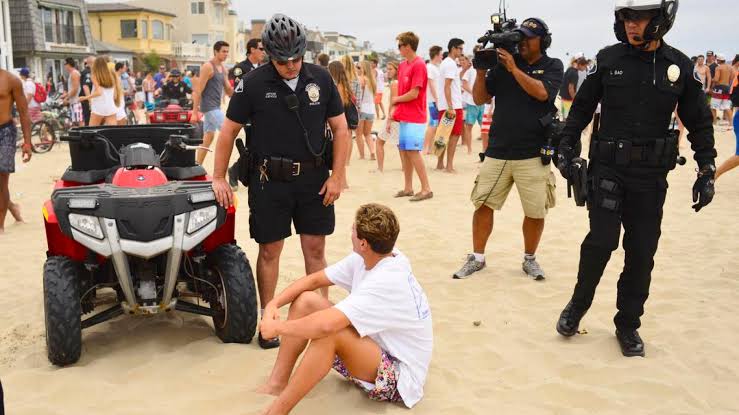 Beach cities prepare for parties, masses with police patrols, triple fines  for offenders – Orange County Register