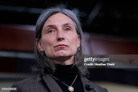 U.S. Rep. Maxine Dexter listens to other members of the CPC at a... News  Photo