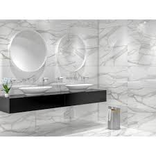 Marble effect wall tiles are used to beautify residential and commercial spaces, be it the kitchen backdrop or the exterior walls of the building. Nepal Marble Effect Grey Rectified 42 7cm X 86 2cm Wall Floor Tile