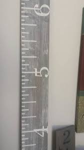 growth chart whitewashed gray growth chart ruler hand