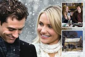 Inside the real life cottage from The Holiday including fireplace and  valley views