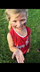 Lily loves to play ball and she can even balance it