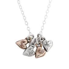 What woman wouldn't love to get a beautiful necklace with all her loved one's names engraved upon it? Personalized Grandmothers Necklace Little Bits Of Love