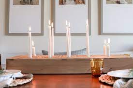 This is a very easy project, but as a mod podger you might not have experience you could create a wooden candle holders centerpiece using one long block with varying height raised sections. Gorgeous Diy Wood Candle Holder Using An Old Beam Twelve On Main