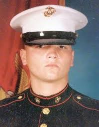 He wore the stripes of a Gunnery Sergeant—and the weight of responsibility  with them. Tom Perry Acton wasn't just a Marine—he was a leader. A teacher.  A warrior committed not only to