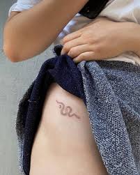 Choose an appropriate snake tattoo for. Snake Tattoo On The Hip