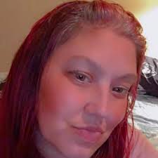 How can I find my mother's biological family, the DeLucas, in  Mechanicsburg, PA?