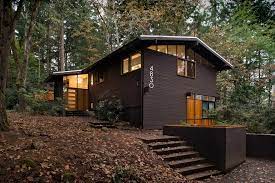 The large glass doors connected the outdoors to the inside of the home. Mid Century Remodel Midcentury Exterior Portland By 2form Architecture Houzz