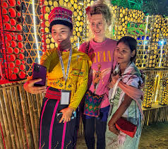 Poi Pee Mau festival celebration with traditional attire